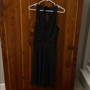 sleeveless black crepe dress